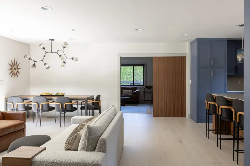 Open living, dining and kitchen area from a JDI Construction whole-house remodel