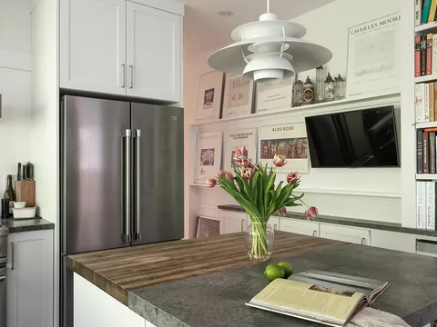Kitchen with built-in bookshelves
