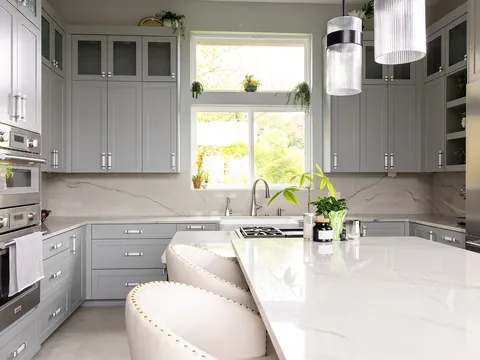 Gray shaker kitchen with a quartz island